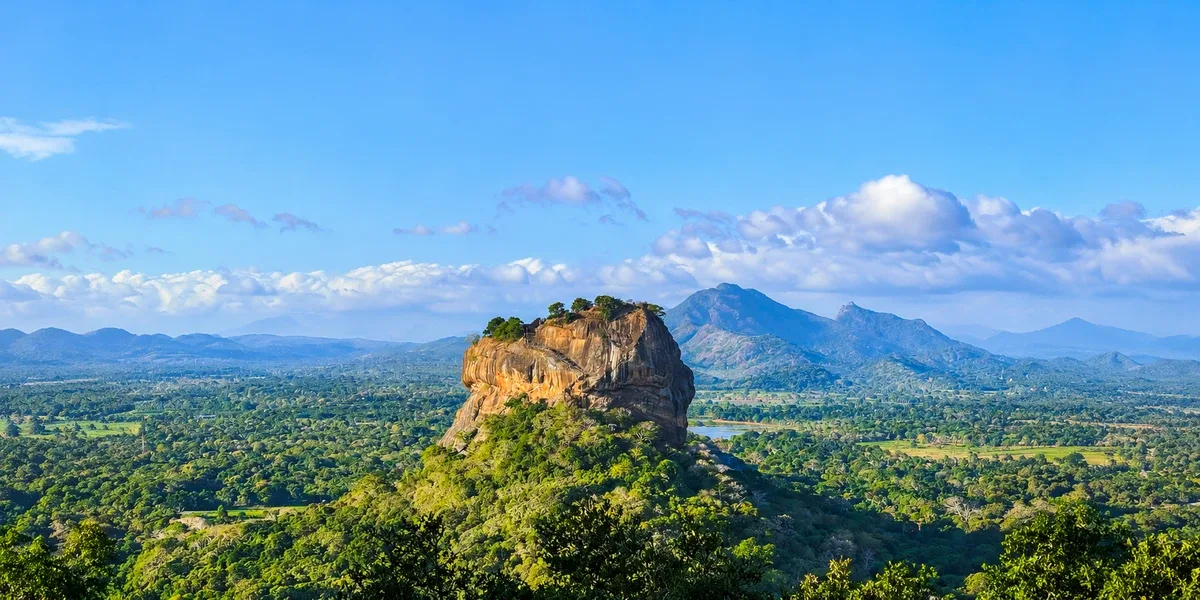 Sigiriya rock surrounded by green landscapes